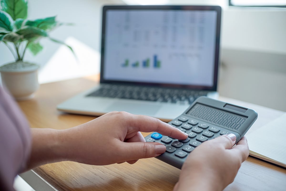 Business Women Checking  Bills. Taxes Bank Account Balance and C